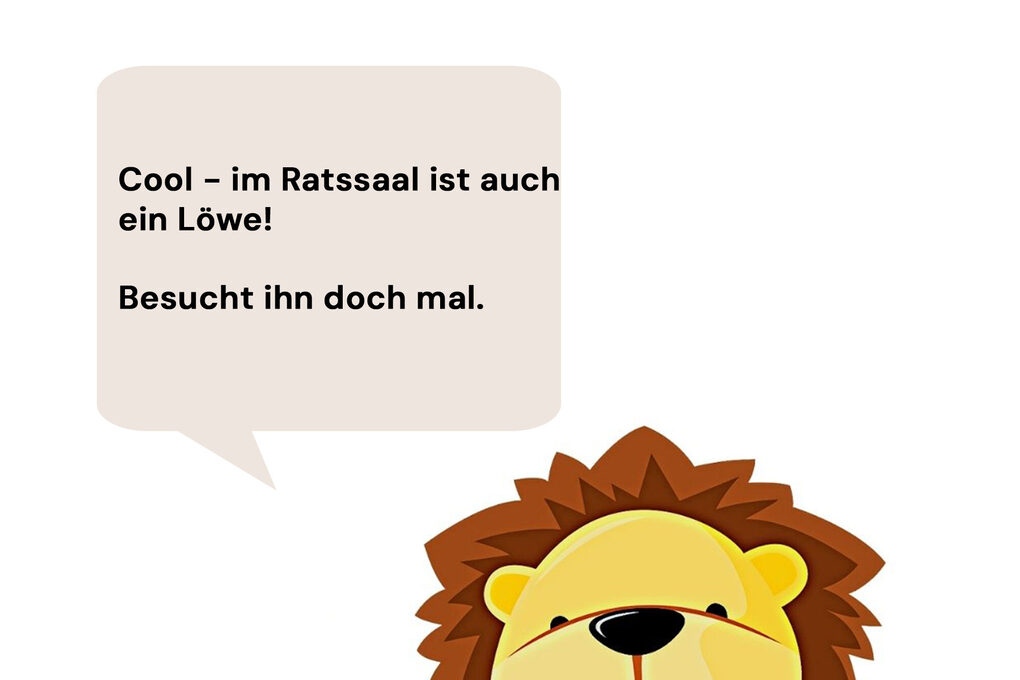 Löwe mit Sprechblase: "Cool, auch im Ratssaal ist ein Löwe. Besucht ihn doch mal!"