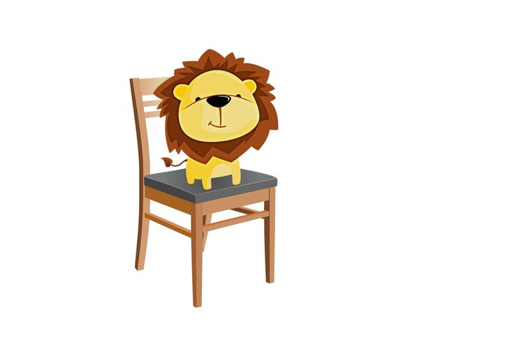 Der kleine Löwe sitzt auf einem Stuhl